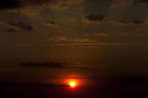 disk of the sun, sunset photo