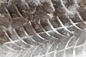 traces of the car in the snow photo