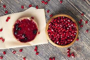 fruit and berry cake tartlet with cream photo