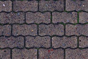 Detailed close up on old historical cobblestone roads and walkways photo