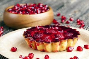 a cake with raspberry jam and cream filling photo