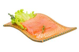 Salmon fillet on the plate and white background photo