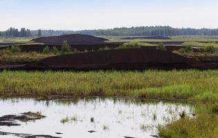 the flooded area where peat is extracted photo