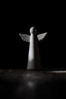 white angel figurine, religious symbols photo