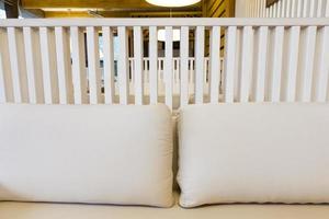 light pillows lying on the sofa in a restaurant photo