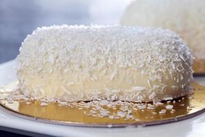 a cake with creamy coconut filling photo