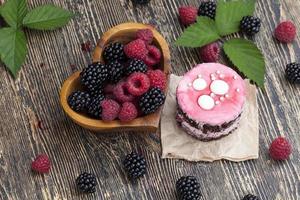 puff chocolate cake with berry filling photo