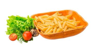 Raw pasta in a bowl on white background photo