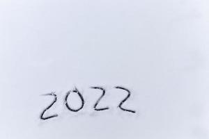 the inscription about the beginning of the new year 2022 photo