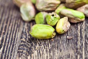 salted and roasted pistachio nuts photo