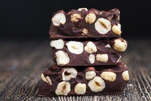 delicious bitter homemade chocolate with lots of nuts hazelnuts photo