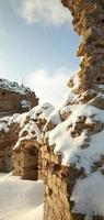 the ruins of an old castle made of red brick photo