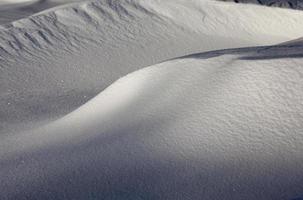 Snow drifts in winter photo