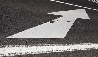 paved road with white road markings for transport management photo