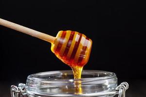 dulce y deliciosa miel natural, de cerca foto
