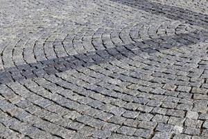 a modern road made of cobblestones and stones photo