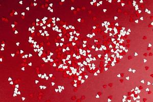 red and white sweet heart shaped candies photo