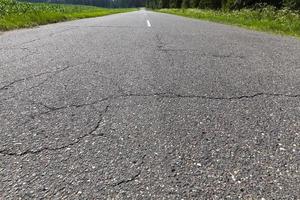 paved road for traffic and people photo