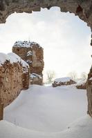 the ruins of an old castle made of red brick photo