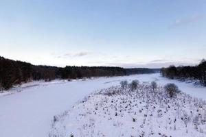 frozen water in the river during frosts photo