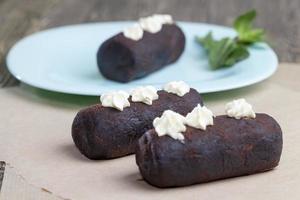 cake is covered with a layer of powdered sugar with cocoa photo