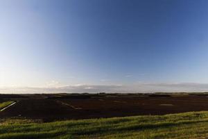 black peat in piles photo