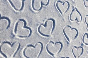 drawn in the winter season, the heart on the snow photo