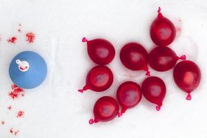 Small balls with red paint photo