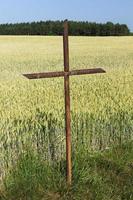 rusty metal cross photo