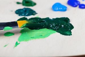 creative process of drawing by mixing different colors photo