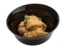 Cod roe in a bowl on white background photo