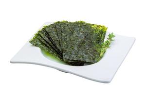 Nori on the plate and white background photo
