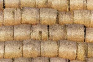 stack of straw in the field photo