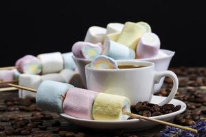 marshmallow is made in different colors of cylindrical shape photo