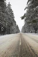 the road in the winter season photo