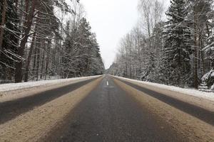 the road in the winter season photo