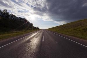 Cloudy rainy road photo