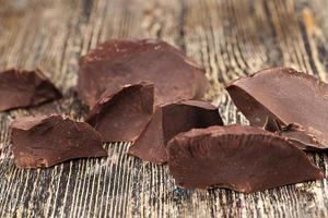 large chunks of chocolate with cocoa photo