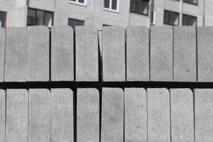 grey curbs and new construction tiles photo