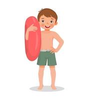 happy cute little boy with swimsuit holding inflatable rubber ring with hand on waist pose having fun on summer time vector