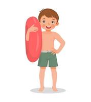 happy cute little boy with swimsuit holding inflatable rubber ring with hand on waist pose having fun on summer time vector