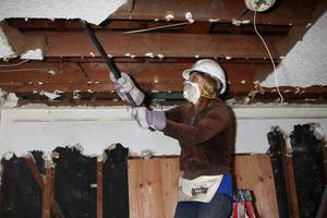 LOS ANGELES, FEB 9 -  Kelly Sullivan demolishing a ceiling at the 4th General Hospital Habitat for Humanity Fan Build Day at the 191 E  Marker Street on February 9, 2013 in Long Beach, CA photo