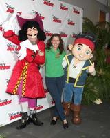 LOS ANGELES, OCT 18 -  Captain Hook, Ione Skye, Jake at the Jake And The Never Land Pirates - Battle For The Book  Costume Party Premiere at the Walt Disney Studios on October 18, 2014 in Burbank, CA photo