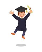 cute little boy student in graduation gown holding certificate diploma jumping in happy graduation day vector