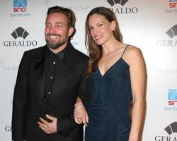 LOS ANGELES, FEB 19 -  Brian Bowen Smith, Hilary Swank at the Icons of the Awards Pre-Oscar Party at a Mr C Beverly Hills on February 19, 2015 in Beverly Hills, CA photo