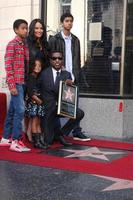 LOS ANGELES, OCT 10 -  Kenny Babyface Edmonds, Children, Fiance at the Kenny Babyface Edmonds Hollywood Walk of Fame Star Ceremony at Hollywood Boulevard on October 10, 2013 in Los Angeles, CA photo