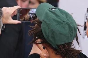 LOS ANGELES, NOV 23 -  Kevin Mazur, Jaden Smith at the 2014 American Music Awards, Arrivals at the Nokia Theater on November 23, 2014 in Los Angeles, CA photo