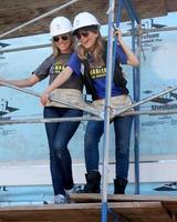 LOS ANGELES, MAR 8 -  Kelly Sullivan, Lisa LoCicero at the 5th Annual General Hospital Habitat for Humanity Fan Build Day at Private Location on March 8, 2014 in Lynwood, CA photo