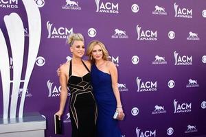 LAS VEGAS, MAR 7 -  Kaley Cuoco, Ashley Jones arrives at the 2013 Academy of Country Music Awards at the MGM Grand Garden Arena on March 7, 2013 in Las Vegas, NV photo