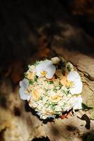 bridal bouquet on a tree photo